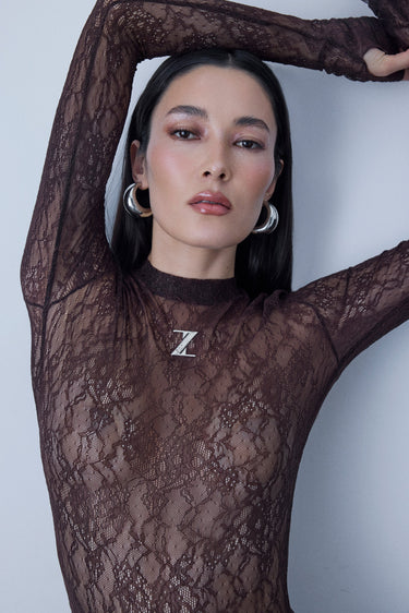 Zeynep Tosun Lace Logo Bodysuit
